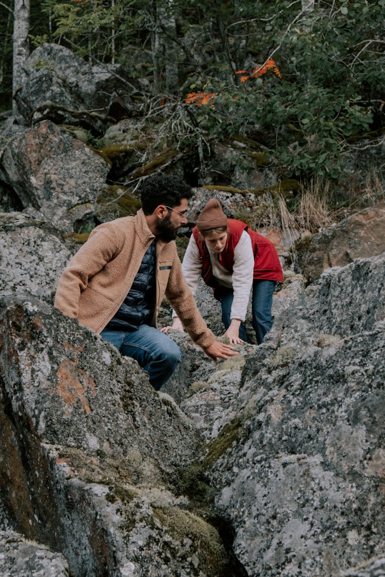 Couple Walking Through Rocks 