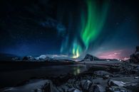 Northern Lights over the Mountains during Night Time
