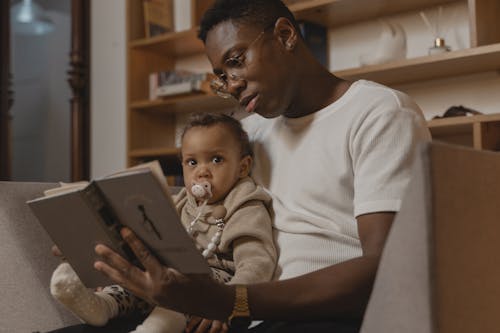 Základová fotografie zdarma na téma african american baby, afroameričan, čtení