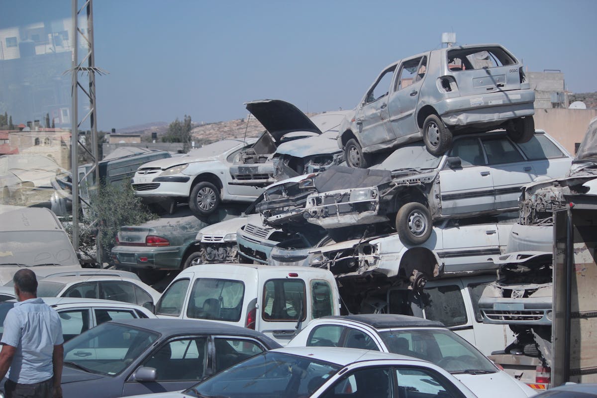 Person relaxing in bed with headphones listening to sleep music