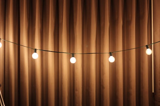 Black String Lights Beside Brown Curtain