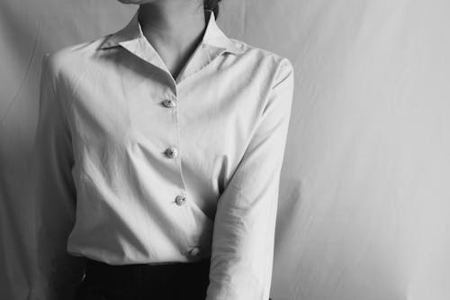 Grayscale Photo of Woman Wearing Long Sleeve Shirt