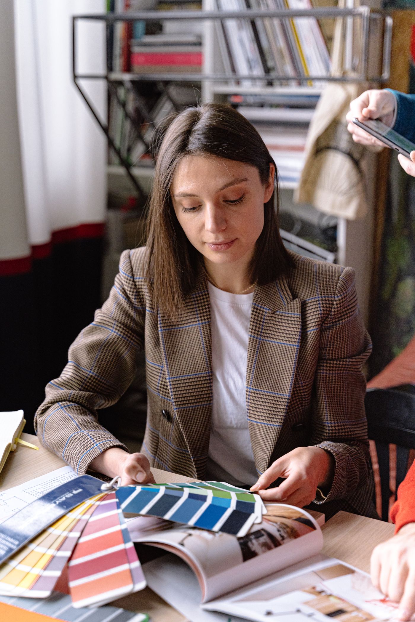 Designer and client choosing colours for a new identity