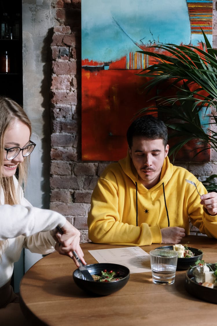 Couple Eating Breakfast Together 