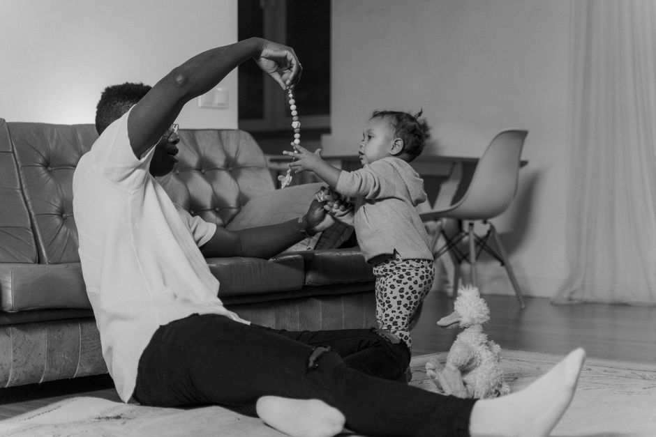 Photo by Tima Miroshnichenko on Pexels A father and child bonding while playing indoors, creating a warm family moment. - Photo by Tima Miroshnichenko on Pexels