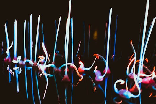Long exposure of colorful light streaks creating an abstract artistic display.