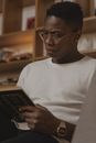 Man in White Crew Neck Shirt Wearing Eyeglasses