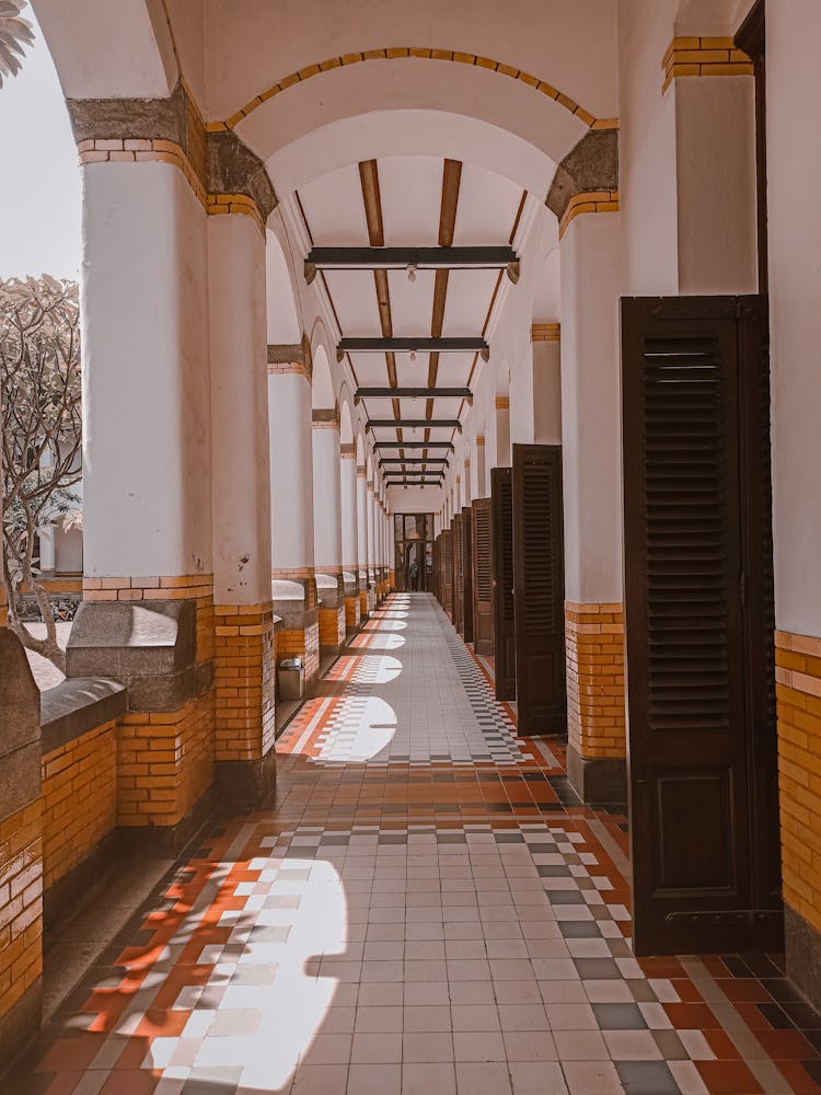 Empty Building Hallway With Doors Open