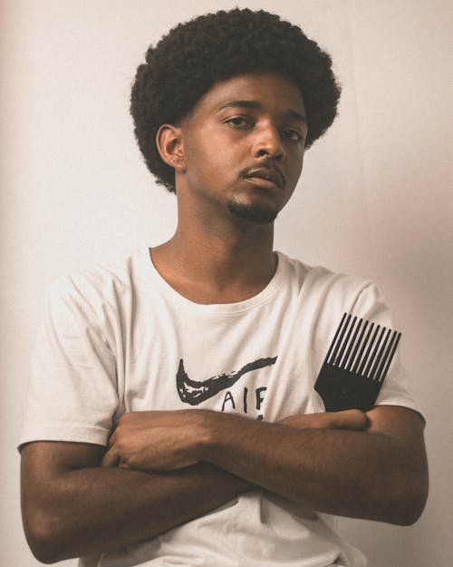 Portrait of Young Man Posing on White Background