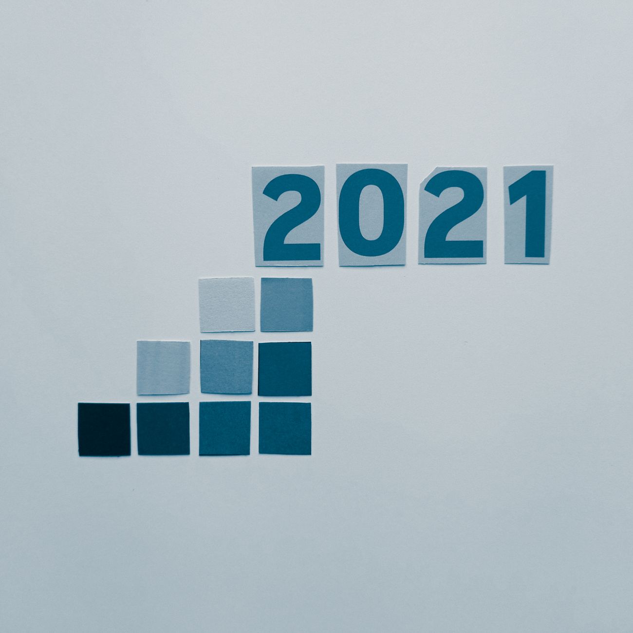 Minimalist 2021 design with paper cutouts