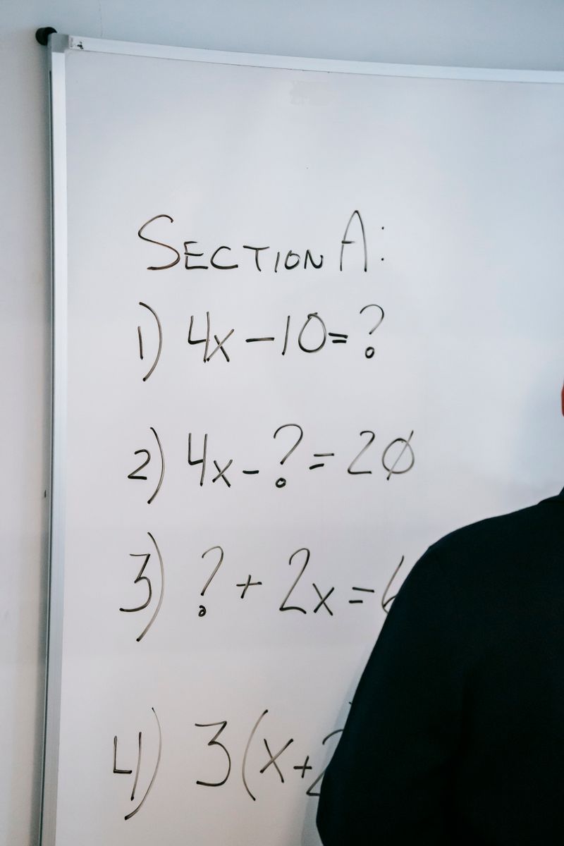 Advanced maths equations on a whiteboard