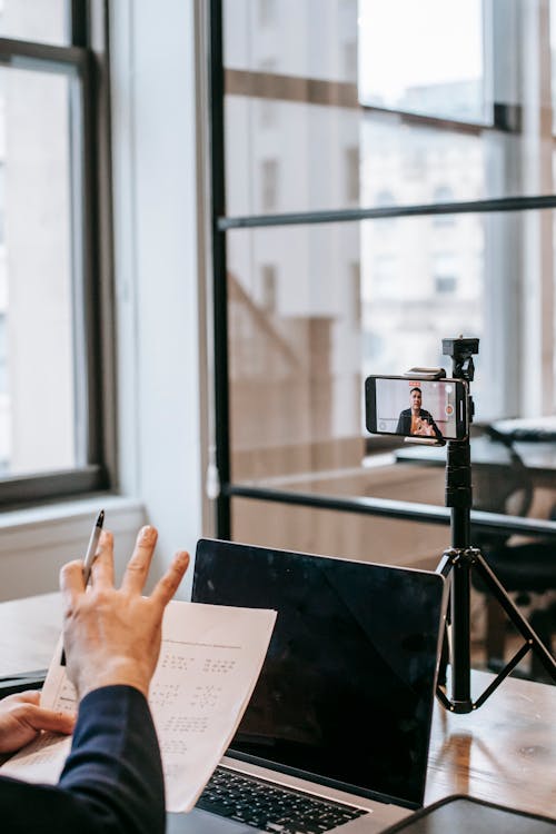 Photo Of Person Teaching On Camera