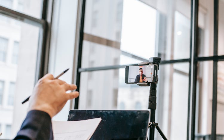 Photo Of Person Teaching On Camera