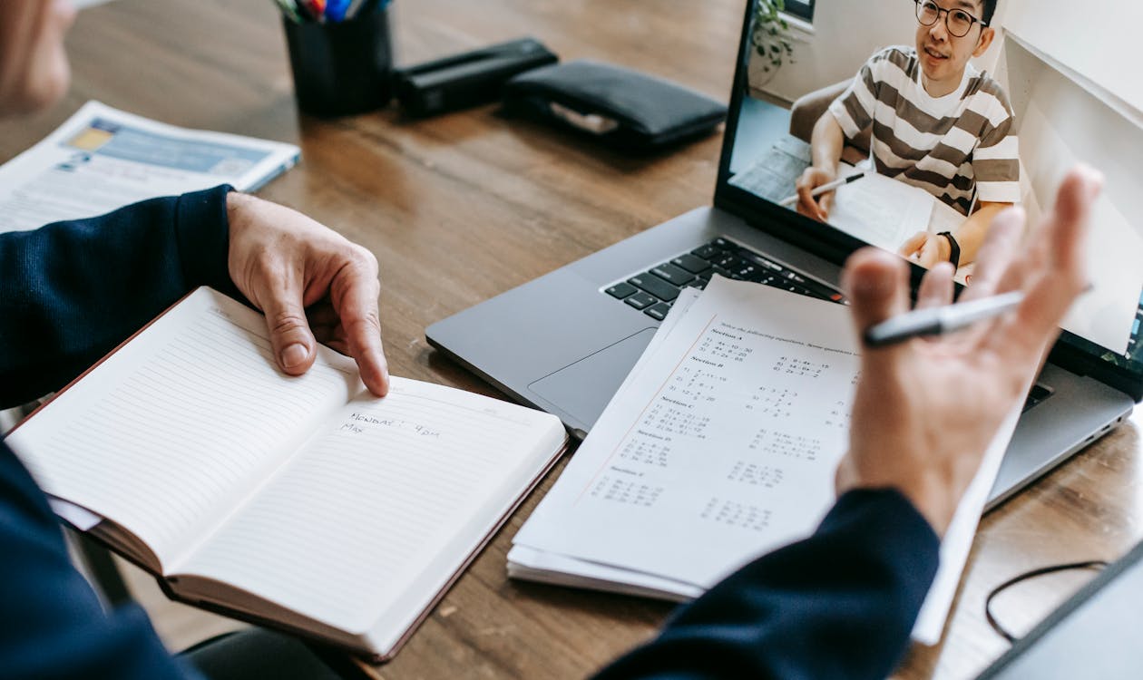 Teacher conducting online diagnostic session with student via video call