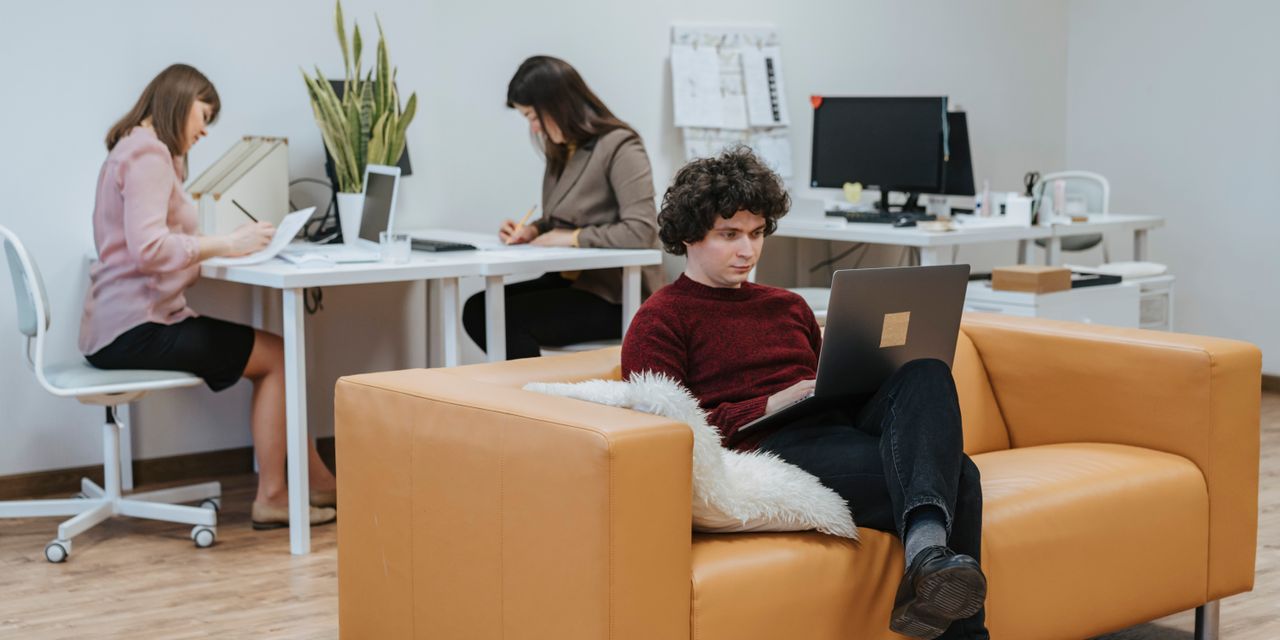 Business owner working on a laptop