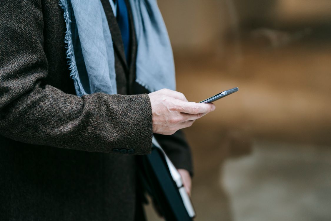Photo Of Person Using Smartphone · Free Stock Photo