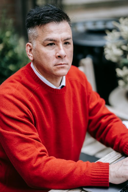 Photo Of Man Wearing Red Sweater