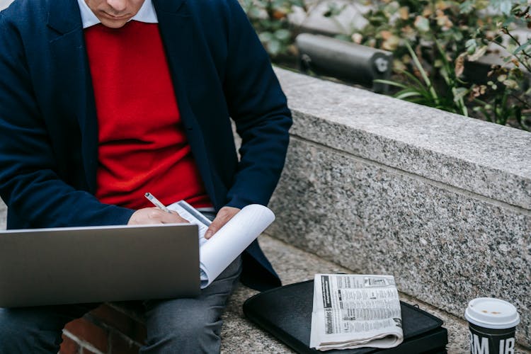 Photo Of Person Multitasking