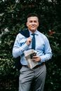 Photo Of Man Wearing Blue Necktie