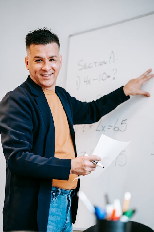 Free Photo Of Man Discussing On White Board Stock Photo