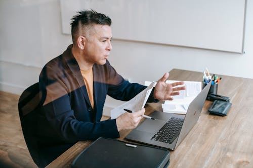 Free Photo Of Man Having Video Conference Stock Photo