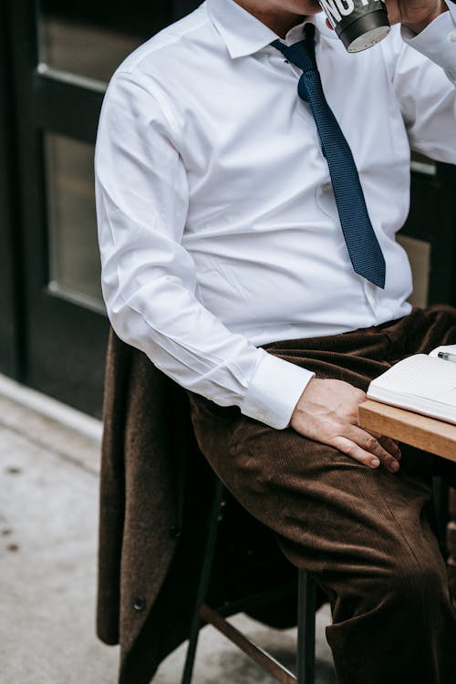 Photo Of Man Wearing Brown Pants