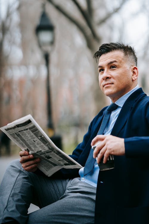 Photo Of Man Holding Beverage