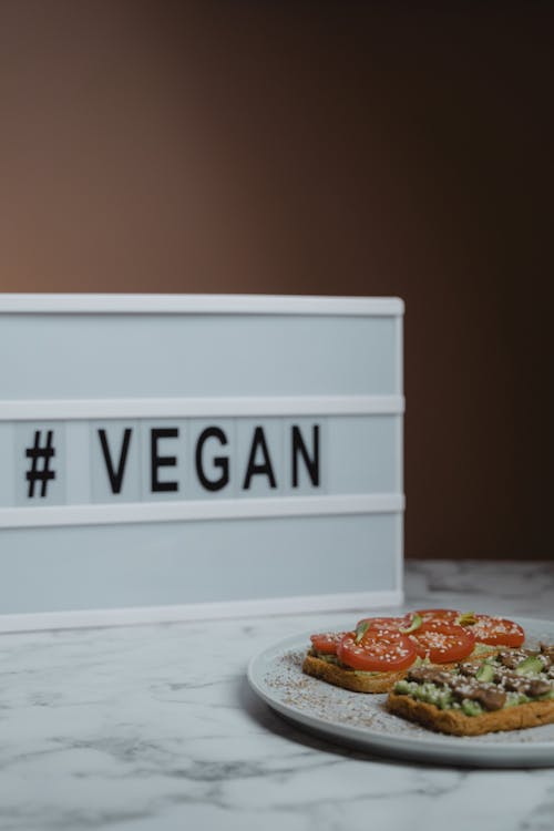 A Ceramic Plate with Healthy Food on the Table