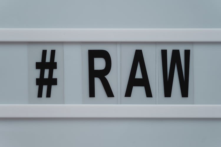 A Raw Word On A Light Box