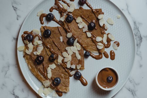  Crepe Top with Almond Flakes and Blueberries