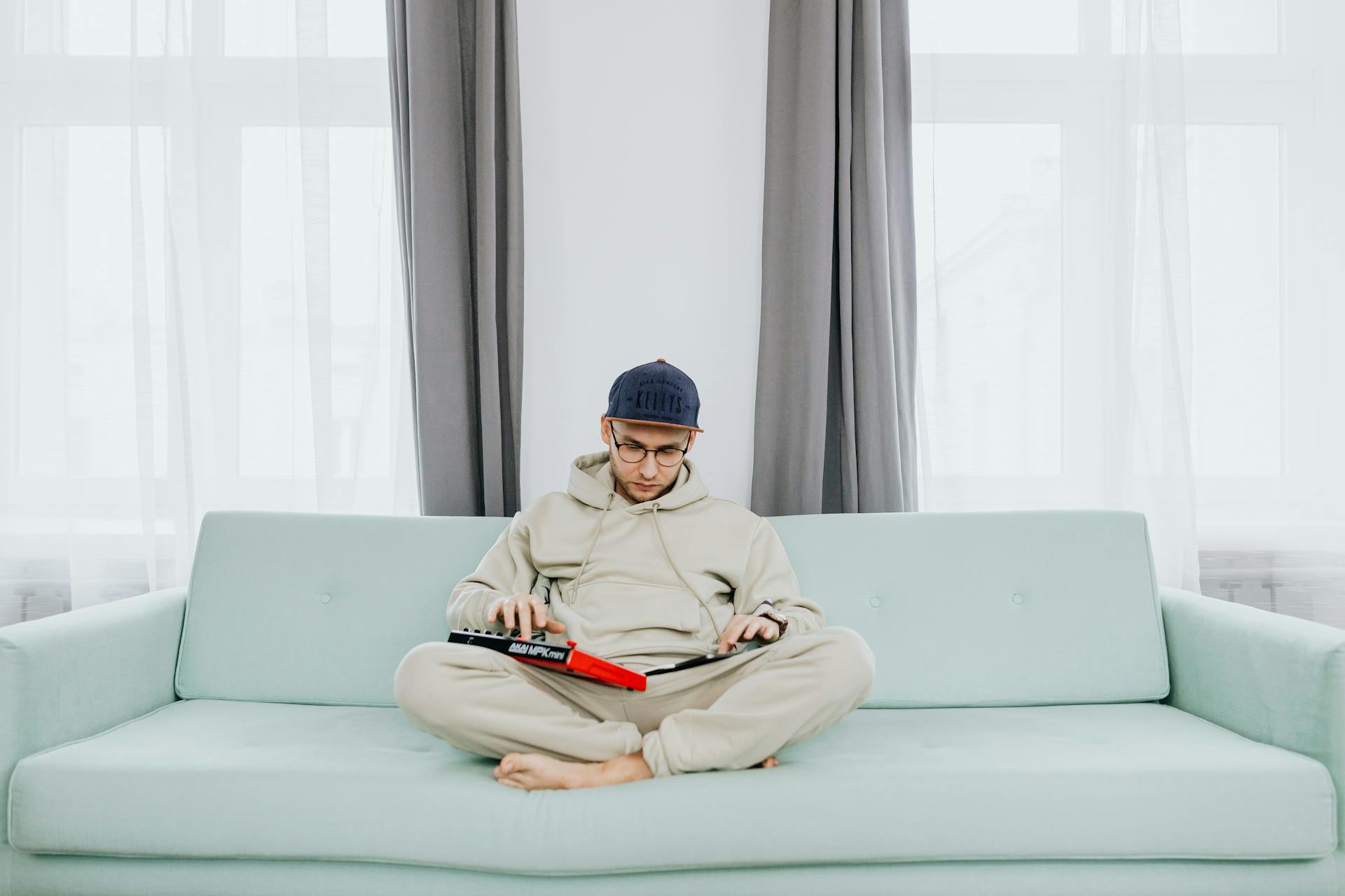 A Man Using Electronic Gadgets