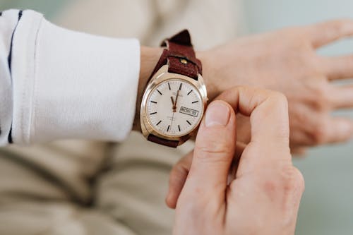 Free Person Wearing a Wristwatch Stock Photo
