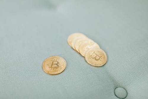 Free Close-Up Shot of Gold Coins  Stock Photo