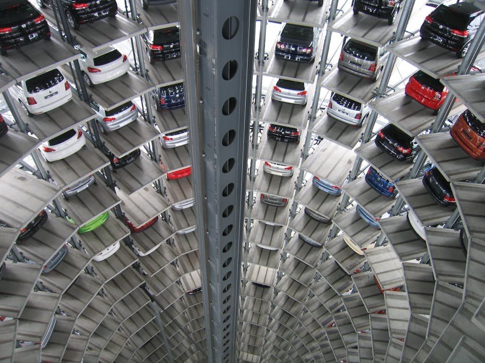 Free Vehicles Parked Inside Elevated Parking Lot Stock Photo