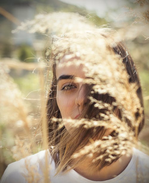 Selective Focus Photo of a Woman with Brown Hair