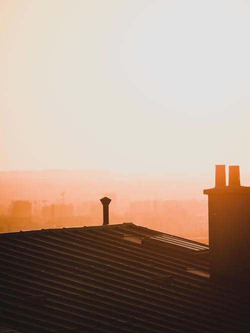 Photo of a Rooftop During Sunrise