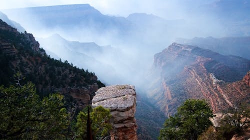 Brown Rocky Mountain With Green Trees 