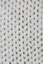 From above texture of knitted wool fabric with seamless pattern as abstract background