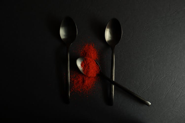Three Spoons And Red Pepper Powder