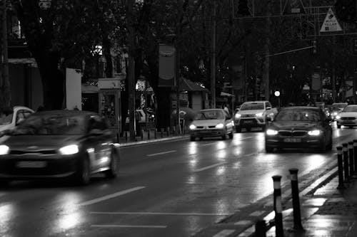Free Grayscale Photo of Cars on Road Stock Photo
