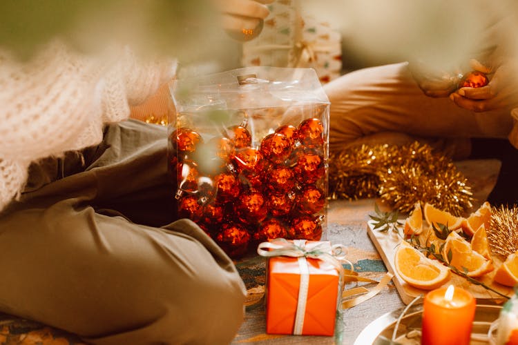 A Red Baubles On A Clear Box