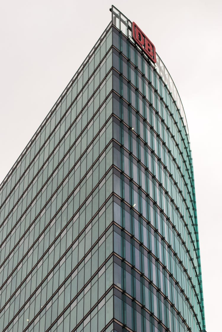 A Building Exterior Made Of Glass Panels