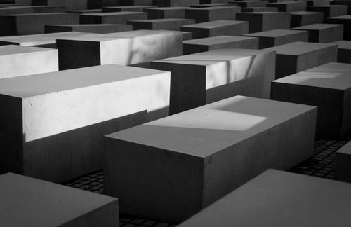 Free Black and white view of concrete blocks creating a geometric pattern in a memorial. Stock Photo