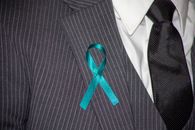 A Ribbon Pin on a Suit Lapel