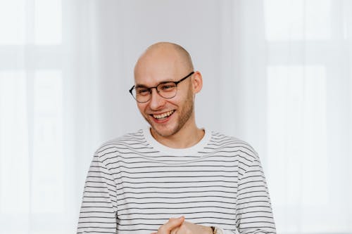 Man with Black Framed Eyeglasses Smiling