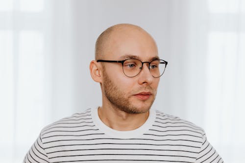 Man Wearing Striped Shirt and Eyeglasses