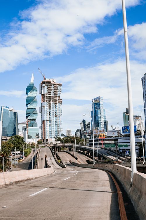 Free Dramatic view of Panama City's skyline featuring the iconic twisted F&F Tower on a clear day. Stock Photo