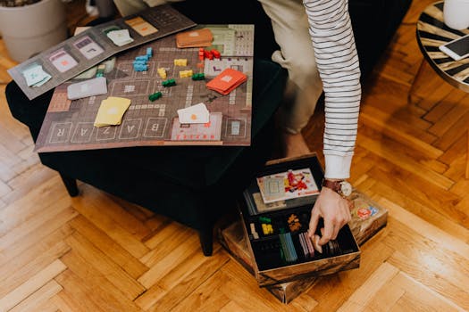 Close-up of a strategic board game with colorful pieces in a cozy indoor space.