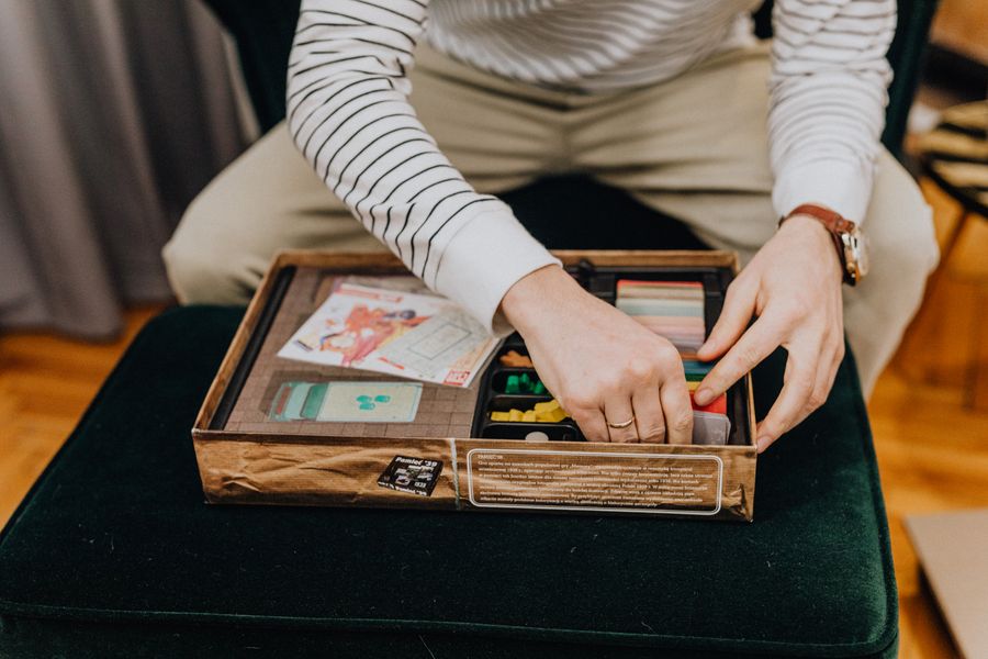 Family playing Ludo at home