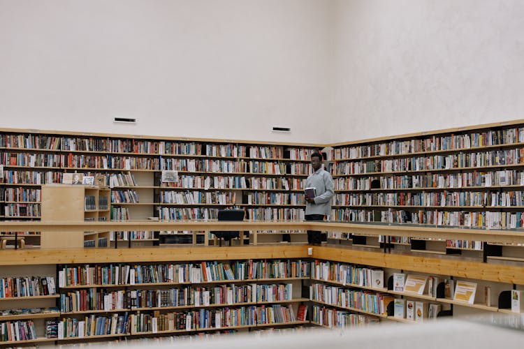 Man On Mezzanine At Library